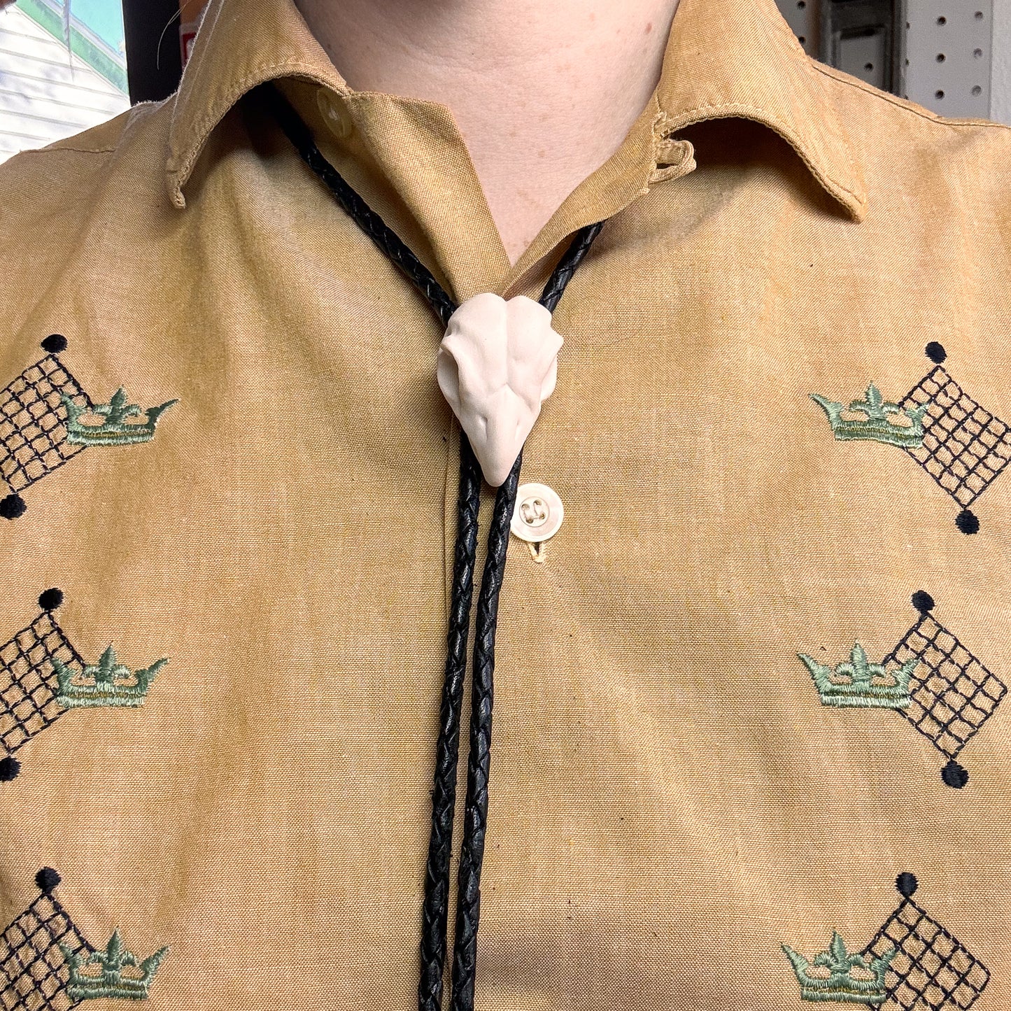 *porcelain*  Grosbeak Skull Bolo Tie